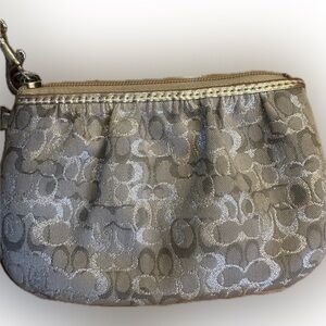 Gold coach mini wristlet